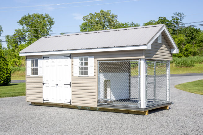 tan residential dog kennels for sale in Montana with white door and shutters